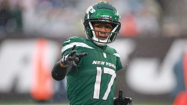 Jets' WR Garrett Wilson checks with an official